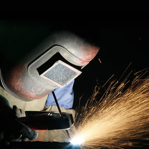 pipe welder working